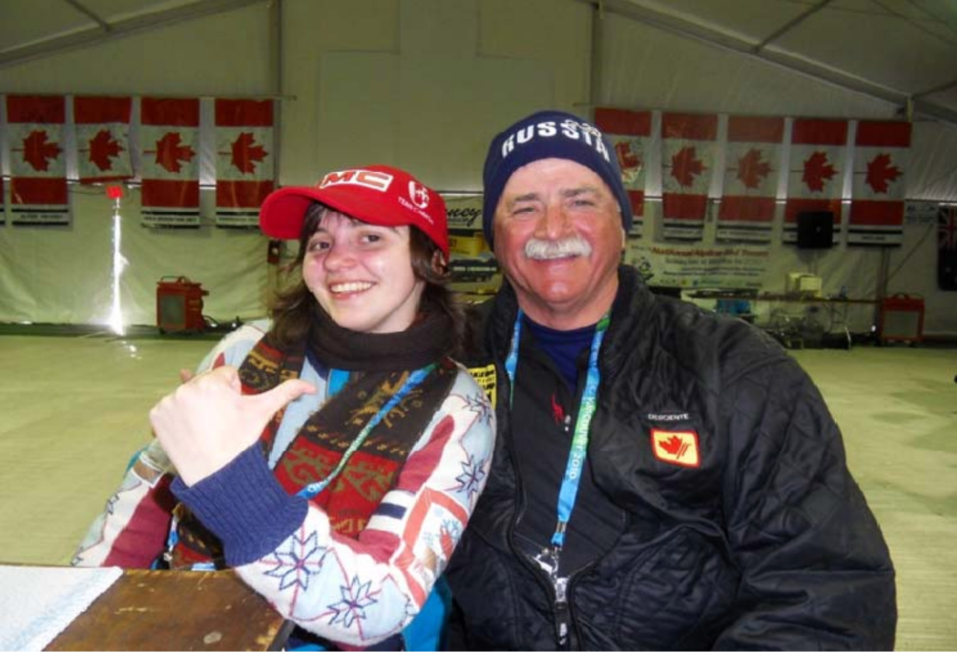 Exchanging hats with a young Russian volunteer from Social Russia