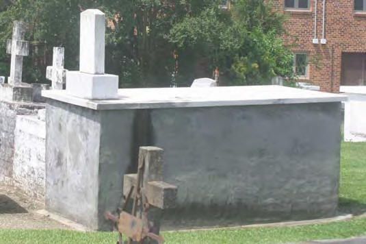 Grave in Old St. Mary Magdalen Catholic Cemetery behind the church in Abbeville, LA