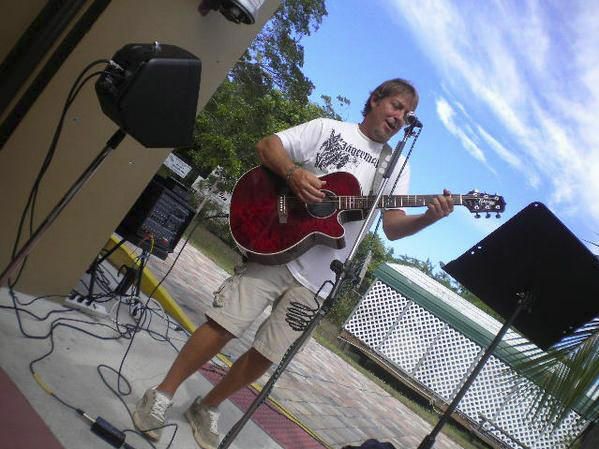 David Emery Guidry playing guitar