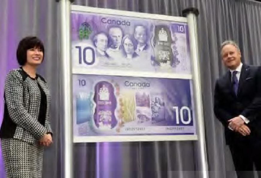 Ginette Petitpas Taylor, Parliamentary Secretary to the Minister of Finance and Stephen S. Poloz, Governor of the Bank of Canada, at the June unveiling of the new $10