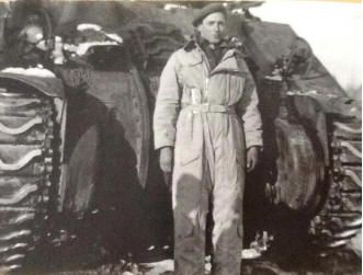 J. Alfred Jeddry next to tank