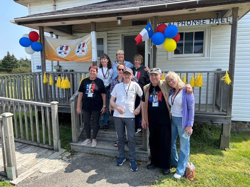 Family members in front of the St. Alphonse Hall